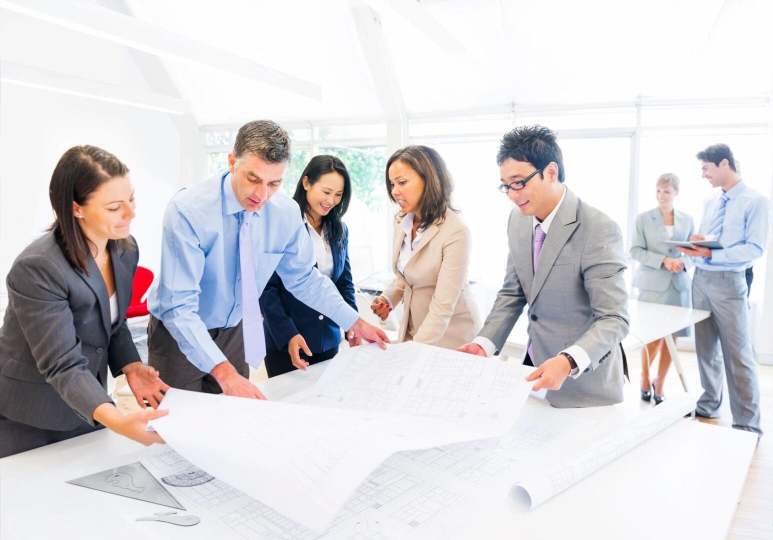 fm=f_6104 A group of people standing around each other.